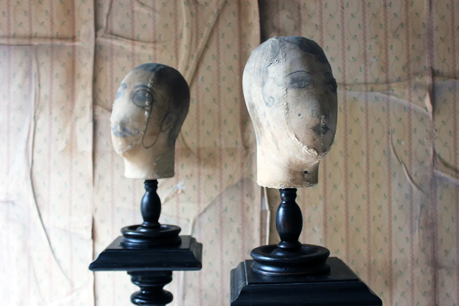 A Decorative Pair of Mannequin Shop Display Heads as a Flapper & Dandy