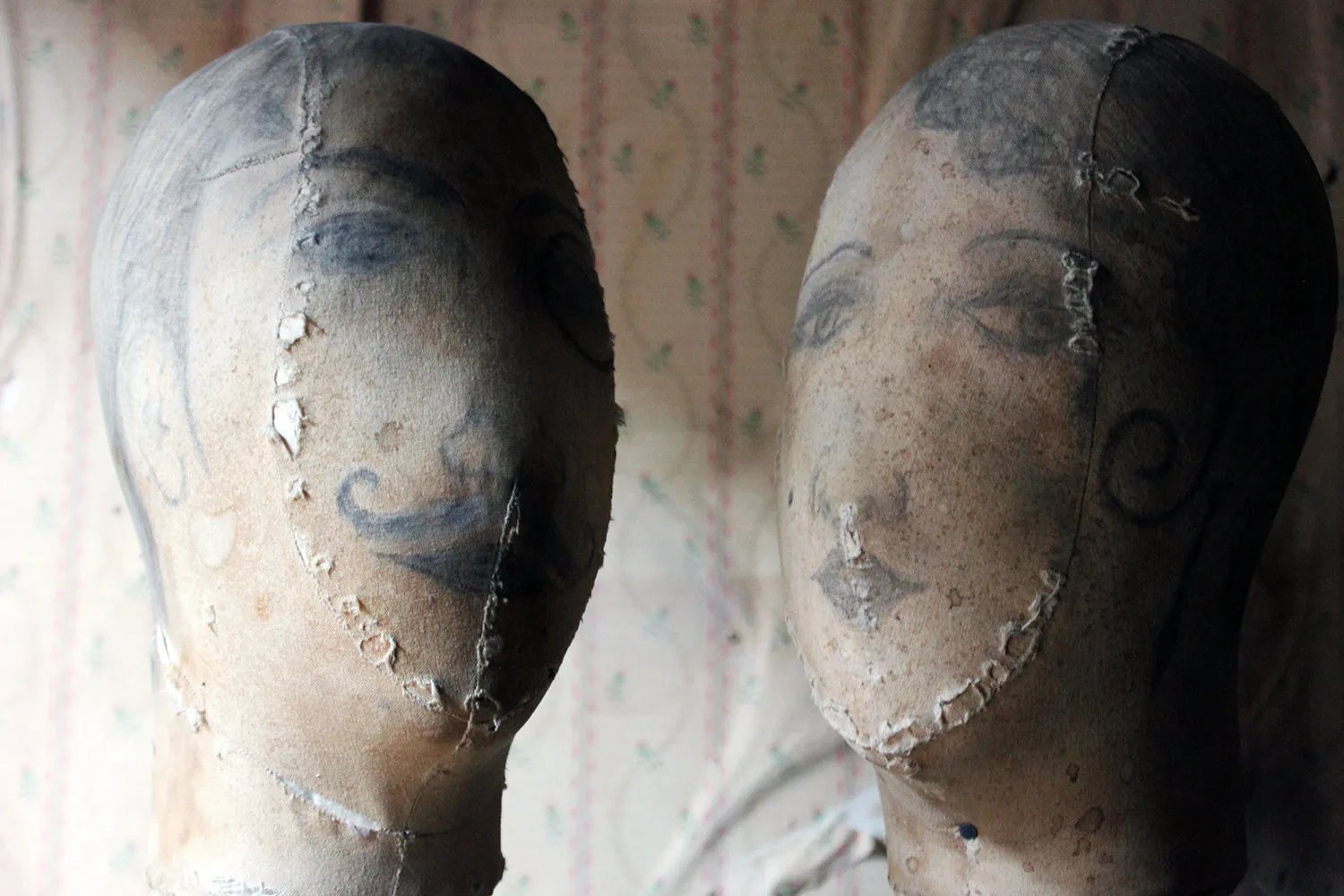 A Decorative Pair of Mannequin Shop Display Heads as a Flapper & Dandy