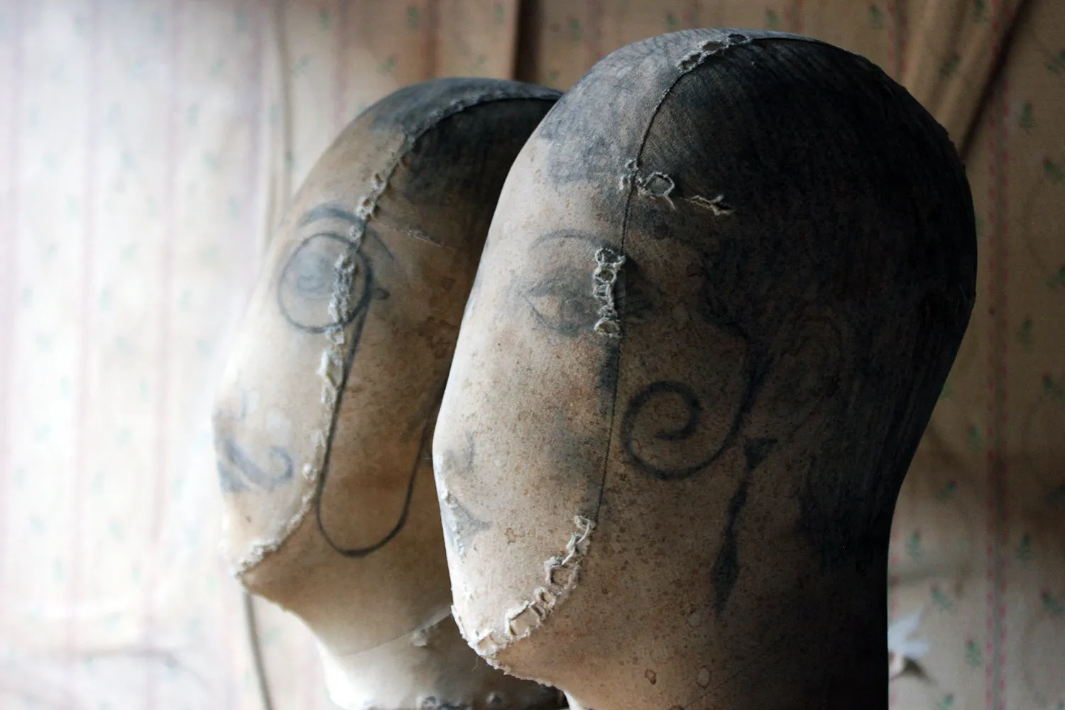 A Decorative Pair of Mannequin Shop Display Heads as a Flapper & Dandy