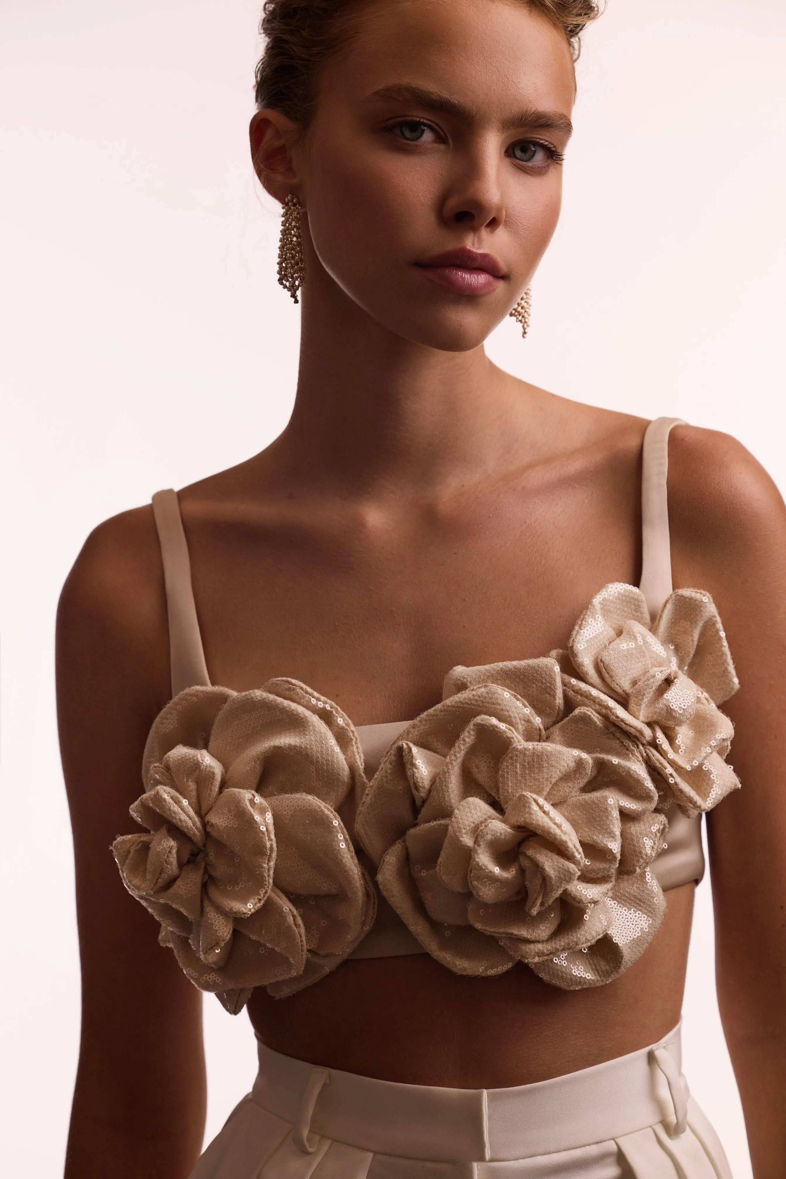 Artful sequined floral applique top