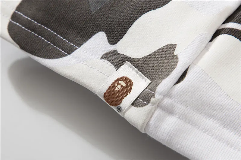 bape camo orange shorts
